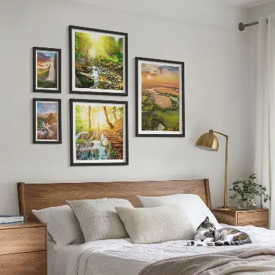 Gallery wall featuring landscapes of waterfalls and valleys