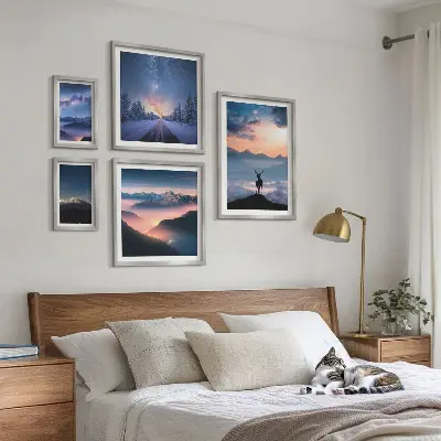 Gallery wall featuring mountain landscapes at night