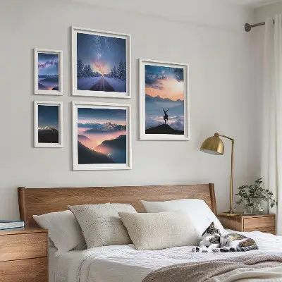 Gallery wall featuring mountain landscapes at night