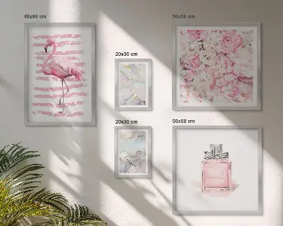 Gallery wall with stylish pink accents and flamingo flowers
