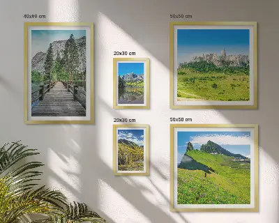Gallery wall featuring mountain landscapes and waterfalls