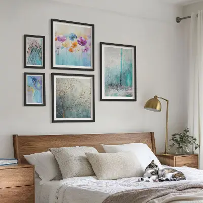 Gallery wall abstract landscapes and flowers