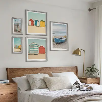 Framed photo set seaside views with houses and boats