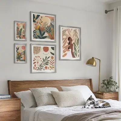 Gallery wall Boho style with a plant figure