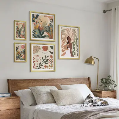 Gallery wall Boho style with a plant figure