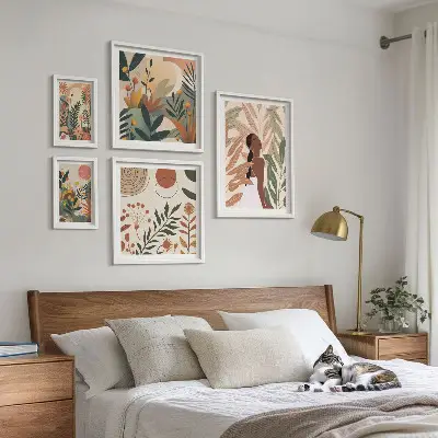 Gallery wall Boho style with a plant figure