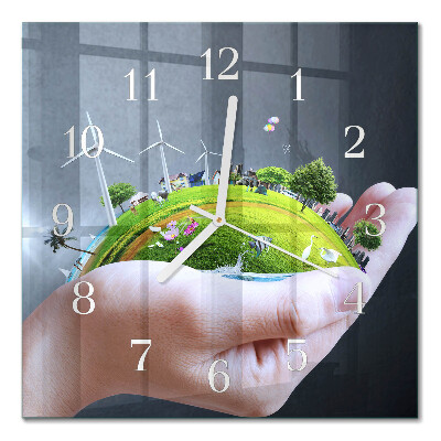 Glass clock square Earth in the hand