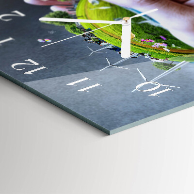 Glass clock square Earth in the hand