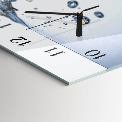 Horizontal wall clock A slice of lemon in water