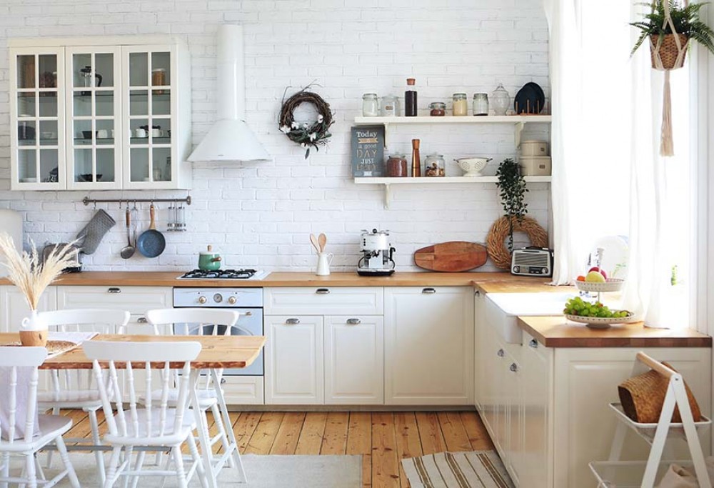 white kitchen with wooden worktop
